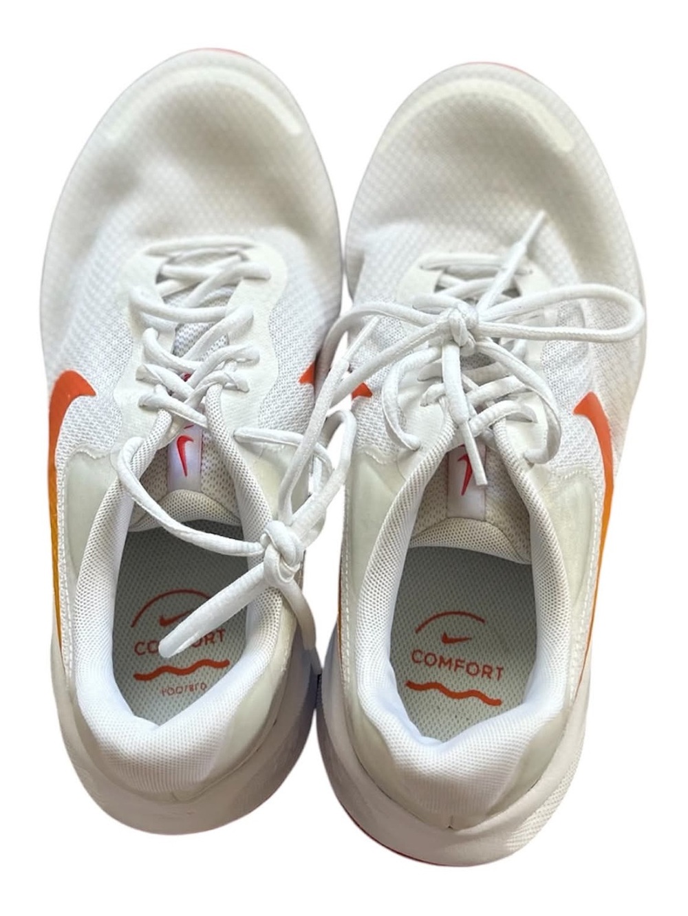 Nike White Sneakers with Orange-Yellow Gradient Swoosh